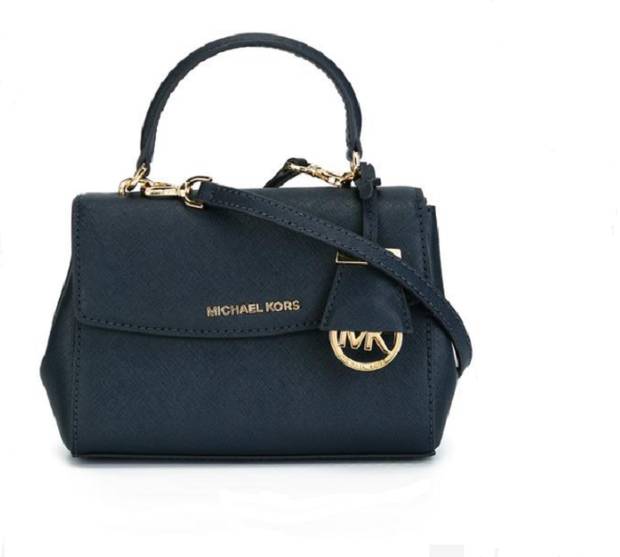 15_bolsos_tendencia_apenas_cabe_el_movil_michael_kors