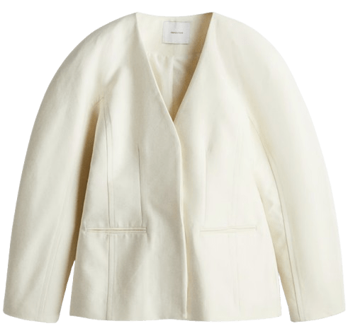 Blazer de sarga sin cuello de H&M.