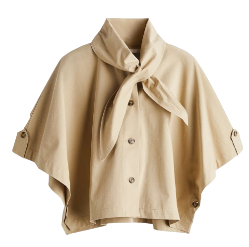 Capa corta estilo gabardina beige claro de H&M, confeccionada en sarga de algodón, con cuello fular, botones delanteros y mangas al codo con trabilla