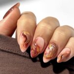 Las «pumpkin spice nails» son las uñas del otoño. Imagen: @thenaillologist